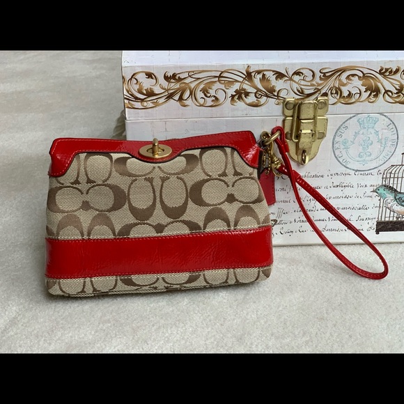 Coach Handbags - Like New COACH Signature red straps Small Wristlet
